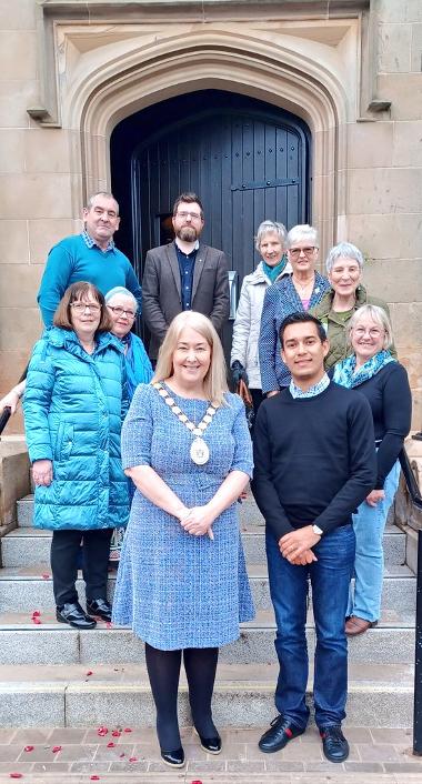 Ards and North Down Fairtrade Steering Group with The Mayor and Jose Aquilar from the COCAFELOL collective in Honduras on the steps of City Hall